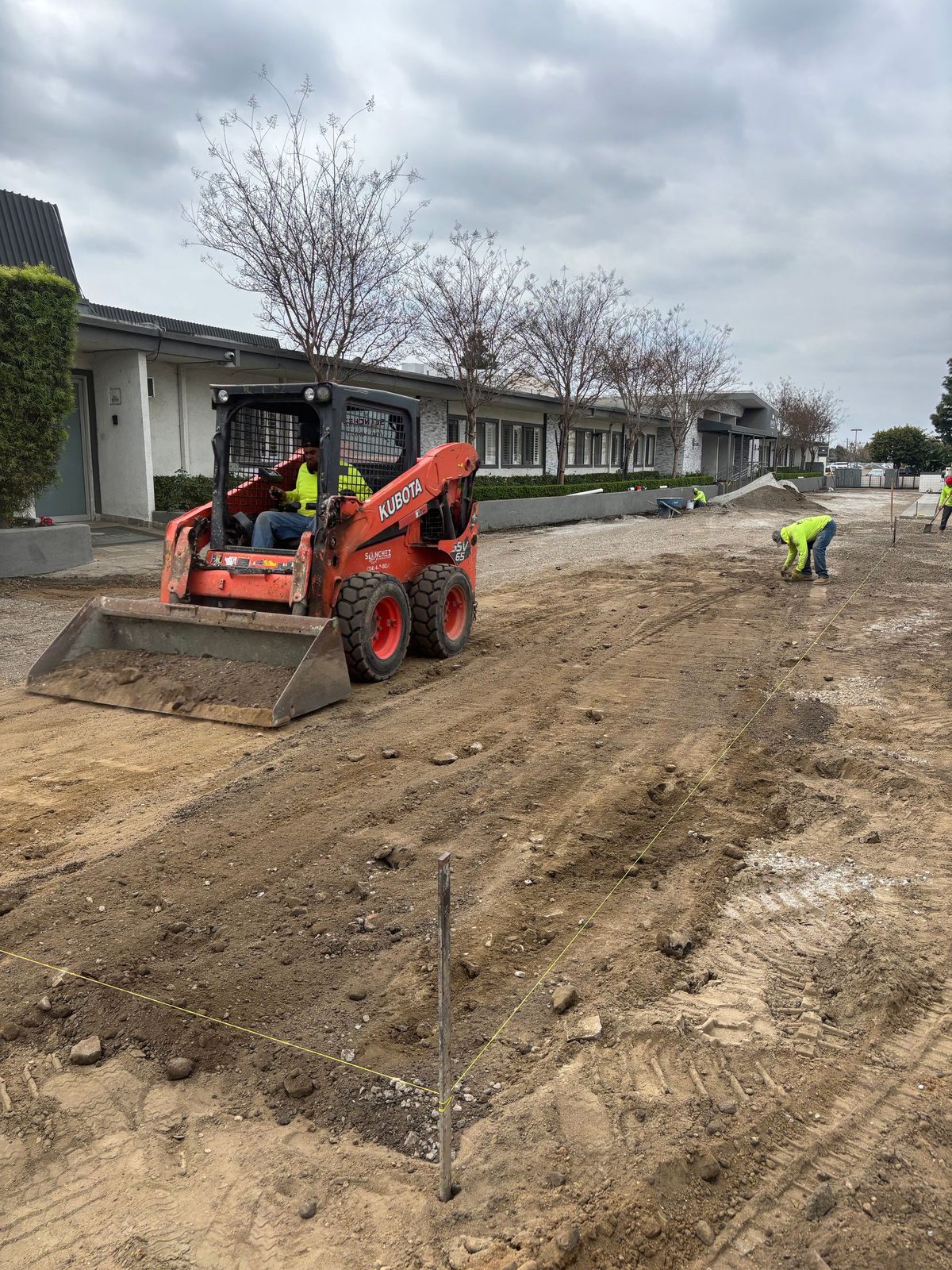 Grading the Anaheim parking lot before the new asphalt